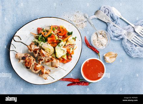 chicken kebab with salad, kebab with sauce and salad Stock Photo - Alamy