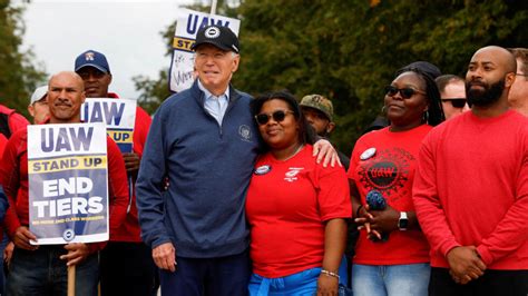 'Stick with it': Biden makes history by joining striking auto workers ...