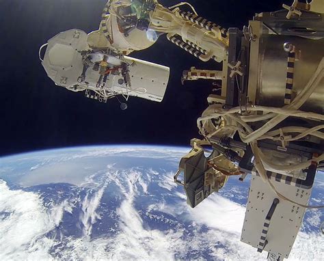 Cosmonauts repeat spacewalk to add new Earth-viewing cameras to space station | collectSPACE