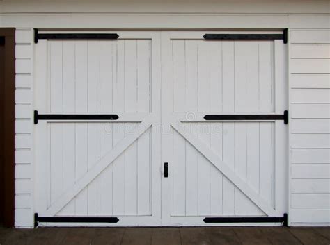 White wooden barn doors stock photo. Image of lock, entrance - 129463978