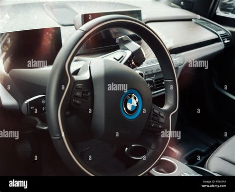 STRASBOURG, FRANCE - OCT 1 2017: BMW I1 electric car interior with the multi-function steering ...