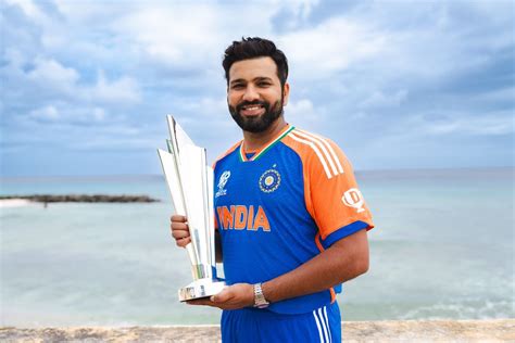 Rohit Sharma poses with coveted T20 World Cup trophy amid lush green ...