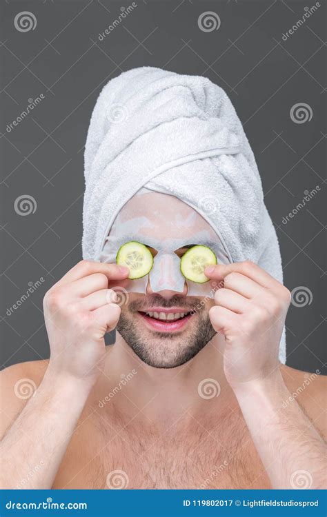 Man with Towel, Collagen Mask and Cucumber Slices on Eyes, Stock Image - Image of studio ...