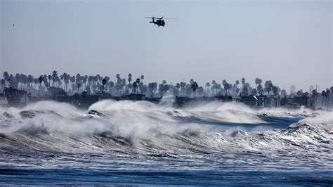 Huge waves leave people injured and cause flooding in California ...