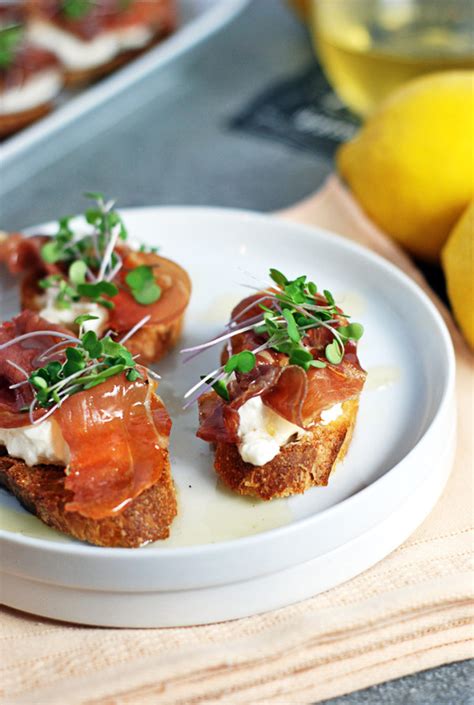 PROSCIUTTO CROSTINI WITH BURRATA AND LEMON HONEY DRIZZLE