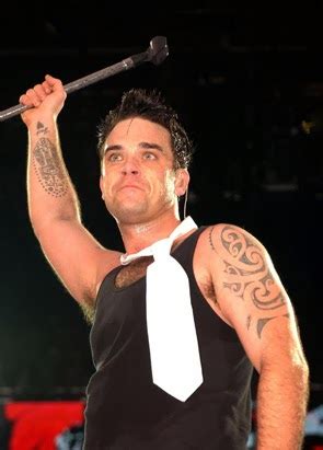 Tattooz Designs: Robbie Williams Tattoos Meanings and Pictures