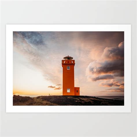 Magical sunset with orange lighthouse in Iceland Art Print by Elena S ...