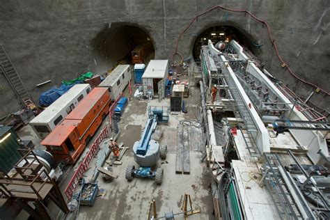 construction equipment is being worked on in a tunnel