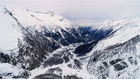 Drone Footage of Snow Covered Mountains in Austria · Free Stock Video