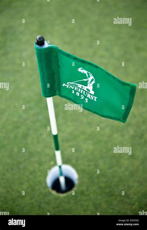 Pinehurst Golf course practice putting green flag Stock Photo - Alamy