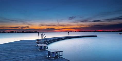 Swimming jetty during sunrise Photograph by Jenco Van Zalk