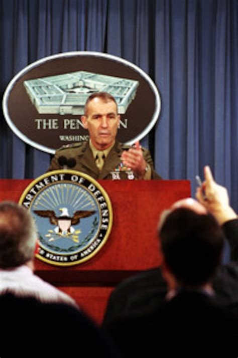 Lt. Gen. McCorkle acknowledges a reporter during a Pentagon press briefing on the Dec. 11th ...