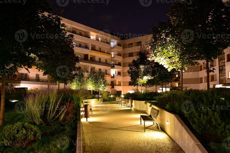 Exterior of apartment building at night 27851739 Stock Photo at Vecteezy