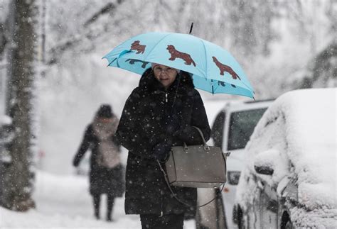 IN PHOTOS: Snowfall blankets parts of Canada as storm moves east ...