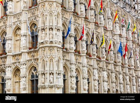 Ancient stone building facade with big windows, old Europe. European ...