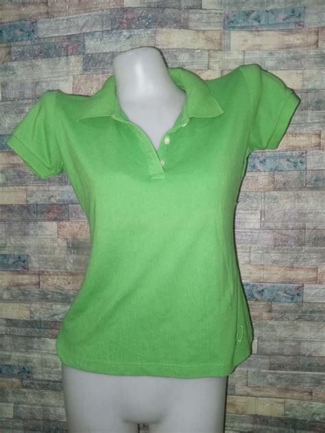 Green polo shirt, Women's Fashion, Tops, Blouses on Carousell