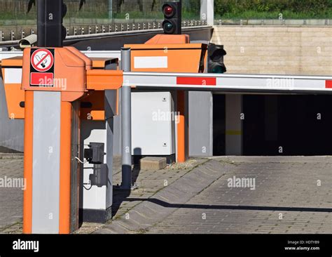 Parking lot gate in the city Stock Photo - Alamy