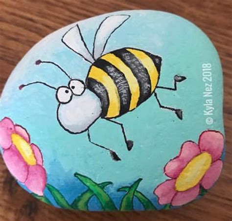 Bee and flowers rock painting | Painted rock animals, Rock art