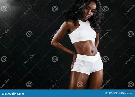 Sporty Fit Black Skin Woman, Athlete Makes Fitness Exercising on Dark Background. Stock Image ...