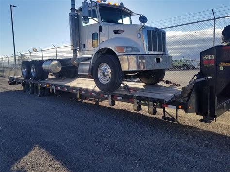 How to Load an Inoperable Semi Truck on a Trailer - Heavy Equipment Transport