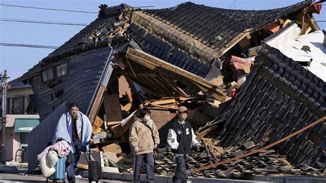 Japan earthquake: Passenger plane crashes in flames in Tokyo after ...