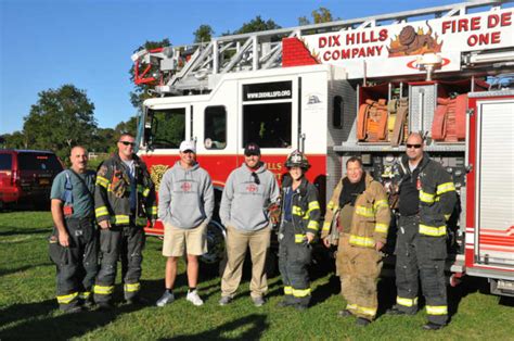 Smithtown football coaches rescued after stuck in air on bucket truck ...