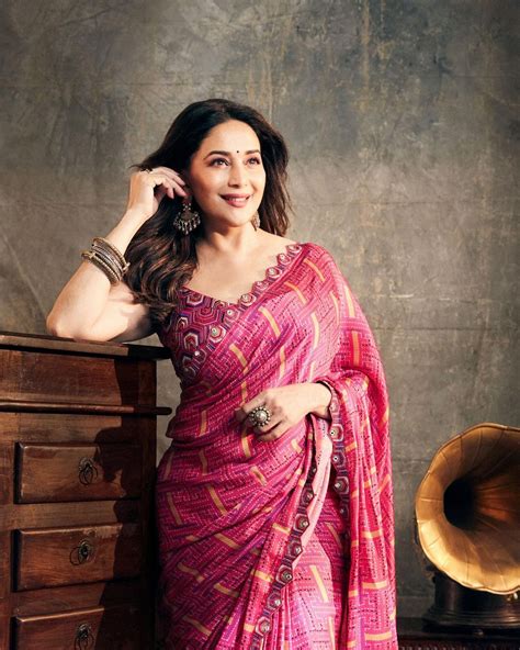 Madhuri Dixit is nothing without her sarees and she sure has one for ...