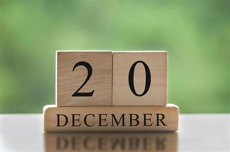 December 20 text on wooden blocks with blurred nature background ...