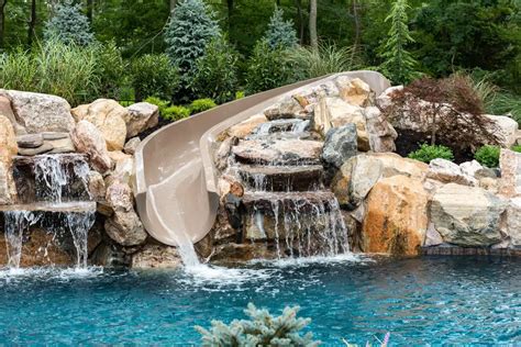 Guide to Pool Slides with Rocks for Your Backyard Oasis