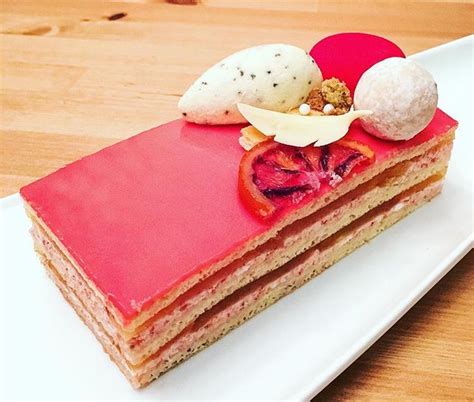 Opera cake "red" - lemon joconde, strawberry buttercream, orange, lemon, and elderflower gelée ...