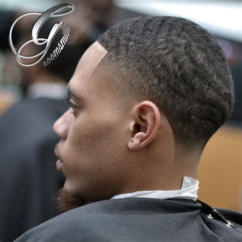 High Taper and waves created by The Groomsmith, Tariq Nevar | Low fade haircut, Taper fade ...