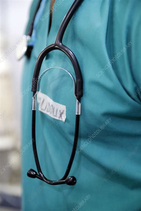 Doctor with stethoscope - Stock Image - C057/1210 - Science Photo Library