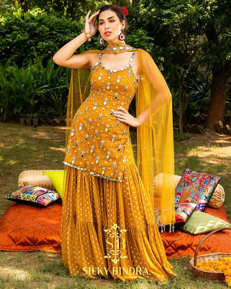 Silky Bindra yellow mirror work sharara. #silkybindra #sharara #indianoutfits #yellow # ...