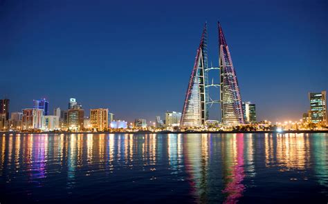 Download Bahrain Bahrain World Trade Center Skyscraper Water Reflection Light Night City Man ...