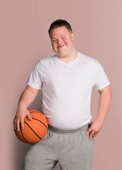 Cute athletic boy syndrome holding | Premium PSD - rawpixel