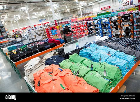 Customers shopping in the clothing section of a Costco Wholesale ...