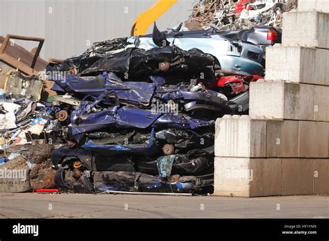 scrap metal cars on scrap yard Stock Photo - Alamy