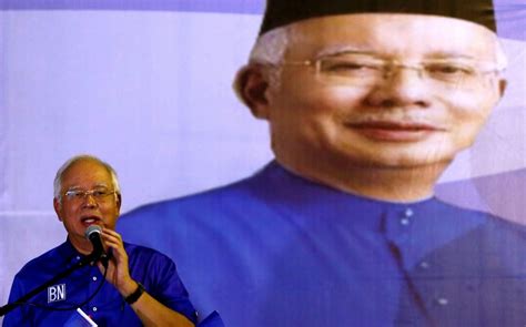 Malaysian prime minister faces fight for his political life after heated election campaign