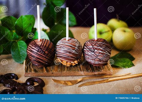 Dessert, an Apple Dipped in Chocolate on a Stick Stock Photo - Image of confectionery, apples ...