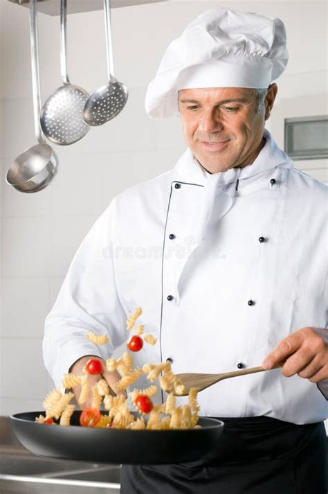 Chef cooking pasta stock image. Image of person, hotel - 26326279