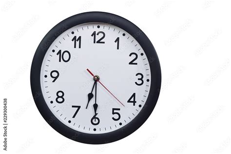 Time concept with black clock at half past six Stock Photo | Adobe Stock