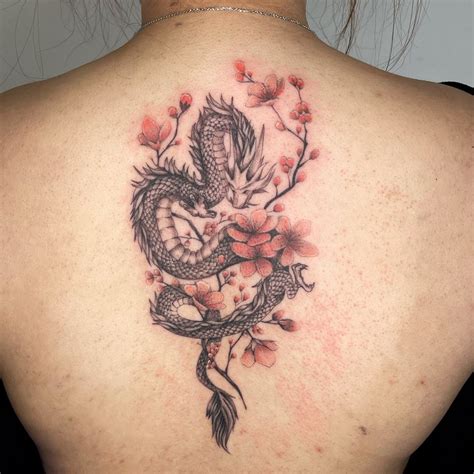 Dragon with cherry blossom tattoo by @ms_aleen | Cherry blossom tattoo ...