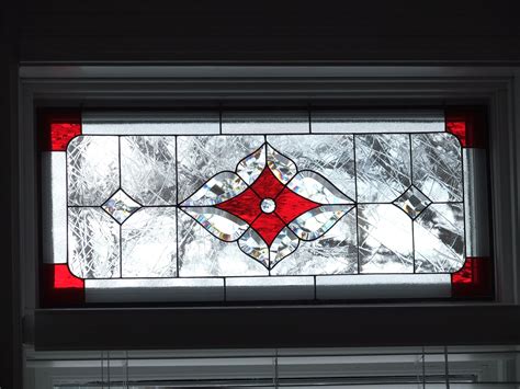 Stained Glass Window with Red and White Designs