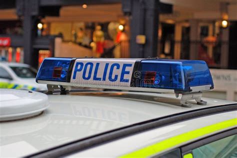 Police Car Lights. Close up of blue lights on top of a UK police car ...