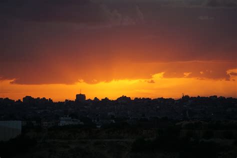 Sunset over Gaza City, as seen from Netiv HaAsara, on the Israel-Gaza ...