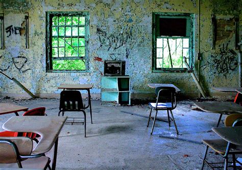 an old room with several chairs and tables in the middle, some have ...