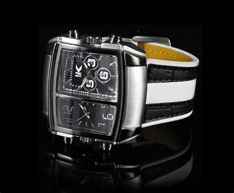 Royalty-Free photo: Square silver and black analog watch with white strap | PickPik