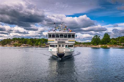 Swedish Archipelago - June 23, 2018: a Ferry Boat Approaching a Small Dock in the Swedish ...