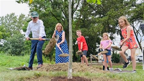 Gov. DeWine, family plant tree at Ohio State Fairgrounds