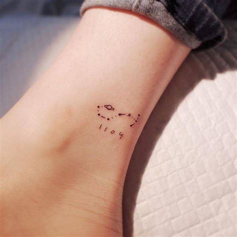 Scorpius constellation tattoo on the ankle.